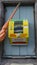 PLYMOUTH, DEVON, UK - March 06 2020: Emergency Defibrillator attached to the back of a cafe on The Hoe