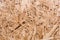 Plywood board texture. Compressed sawdust panel background. Wood surface for interior design and decoration.