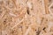 Plywood board texture. Compressed sawdust panel background. Wood surface for interior design and decoration.