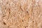 Plywood board texture. Compressed sawdust panel background. Wood surface for interior design and decoration.