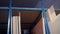 Plywood sheets on the shelves in the factory floor. Sheets in the warehouse for the production of furniture. Warehouse of sheets