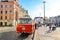 Plzen, Czechia - Oct 28, 2019: Vintage red bus on the main square in Pilsen, Bohemia, Czech Republic. Part of the national holiday