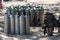 Pnaglao, Bohol, Philippines - January, 26, 2020: Many scuba diving air oxygen tanks cylinders at the beach