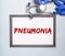 Pneumonia word inscription. Medical diagnosis, illness of lungs