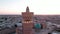 Po-i-Kalyan mosque complex in Bukhara and Kalyan Minaret at sunset, drone aerial