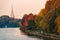 Po river in turin city with mole antonelliana and people walking in part