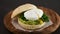 Poached egg and avocado bagel sandwich