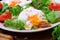 Poached egg with liquid yolk and green salad
