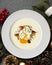 Poached egg with potato cream and mushrooms