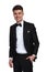 Poatrait of joyful relaxed groom wearing a black tuxedo