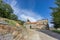 Pobladura de aliste romanic church wide angle view over blue sky