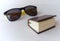 Pocket book translator and sunglasses