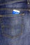 In a pocket dark blue jeans inserted bus ticket