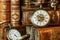 Pocket watch and old books