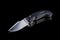 Pocketknife on a black background