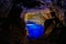 Poco Encantado, blue lagoon with sunrays inside a cavern in the Chapada Diamantina, Andarai, Bahia, Brazil