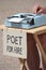 Poet for hire with typewriter