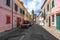 POGGIO, ELBA ISLAND, ITALY - SEPTEMBER 16, 2018: Small street with colorful houses in a town Poggio, Elba island