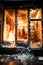 Pogroms and riots in night city. Broken shop window on fire