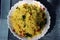 Poha or Kanda Poha popular Maharashtrian breakfast recipe made from red or white flattened rice, potatoes, onions, herbs and spice