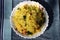 Poha or Kanda Poha popular Maharashtrian breakfast recipe made from red or white flattened rice, potatoes, onions, herbs and spice