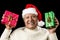Poignant Aged Man Showing Red And Green Xmas Gifts