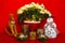 Poinsettia in a Red Basket with Candles, Snowman and Reindeer
