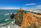 Point Bonita Lighthouse on the rock under blue sky, California