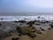 Point Dume. Foam Wave. Rocky shore.