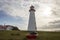 Point Prim Lighthouse, PEI and old wooden rowboat