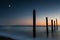 Point Roberts pilings and silky water at night time