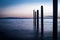 Point Roberts pilings and silky water at night time