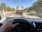 Point of view of a driver behind an empty stork truck