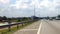 Point of view riding motorcycle in North South highway exiting Putra Mahkota. Hyperlapsed