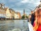 Point of view shot of a beautiful cityscape of Bruges city, Belgium, taken from a boat