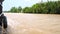 Point of view from the side of a traditional Vietnamese boat sailing on the Mekong River, Vietnam