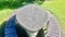A pointed oval stone picnic table and chairs. marquise stone table.