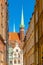 Pointed towers of St. Maryâ€™s Basilica - Bazylika Mariacka - in back of Kramarska street in the historic old town city center