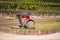 The pointer to the wine store in the province Bolzano in Italy. wooden barrel on the vineyard background