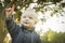 Pointing Adorable Blonde Baby Boy Outdoors at the Park