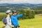 Pointing cyclists couple on summer weekend nature