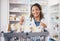 Pointing, pharmacy or portrait of happy woman with medicine in healthcare retail or wellness clinic. Smile, help desk or