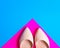 Pointy shoes on colorful pink and blue background. free copy space. Fashion concept