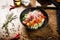 Poke with beef: Glass noodle, avocado, edamame and mango in a bowl. Delicious healthy food closeup served for lunch on a