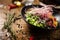 Poke with beef served in a black bowl in restaurant