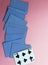 Poker cards are onf the pink background. Poker play. Place for text.