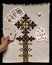 Poker cards on a tablecloth with embroidered geometric patterns in the Ethiopian style