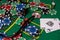 poker chips, money, stethoscope on blackjack table