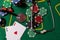 poker chips, money, stethoscope on blackjack table.
