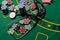 poker chips, money, stethoscope on blackjack table